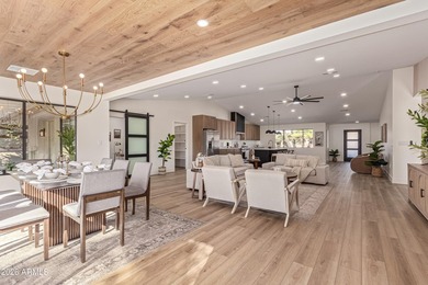 E X Q U I S I T E Golf Course Residence. Inside, you'll find a