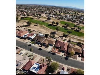 E X Q U I S I T E Golf Course Residence. Inside, you'll find a