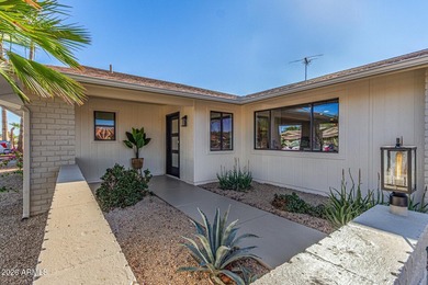 E X Q U I S I T E Golf Course Residence. Inside, you'll find a