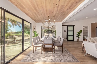 E X Q U I S I T E Golf Course Residence. Inside, you'll find a