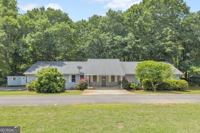 Charming 3-bedroom, 2.5-bath ranch home situated on a spacious 1 - photo 1