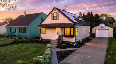 Tucked into a quiet West St. Paul neighborhood, this charming - photo 1