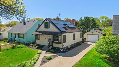 Tucked into a quiet West St. Paul neighborhood, this charming - photo 3