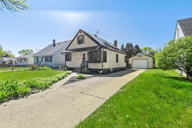 Tucked into a quiet West St. Paul neighborhood, this charming - photo 6