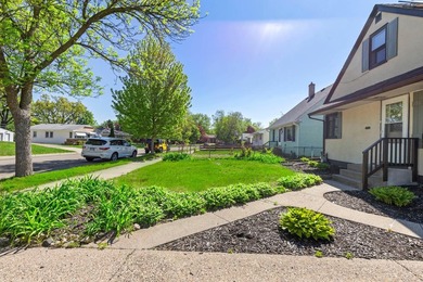 Tucked into a quiet West St. Paul neighborhood, this charming - photo 9