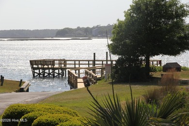 Located in the gated community, this vacant lot awaits your new - photo 3