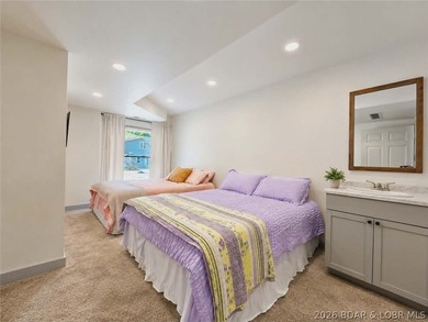 Step inside to vaulted ceilings and a stunning primary suite - photo 11