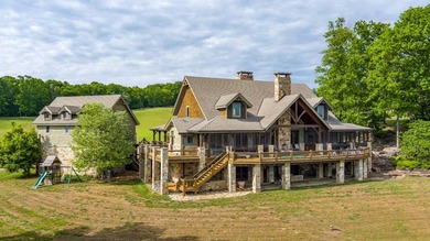 Perched to maximize its panoramic Dale Hollow Lake views, this - photo 11