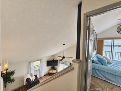 Step inside to vaulted ceilings and a stunning primary suite - photo 14