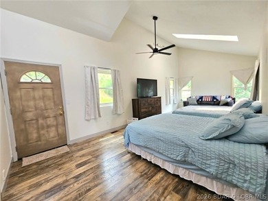Step inside to vaulted ceilings and a stunning primary suite - photo 18