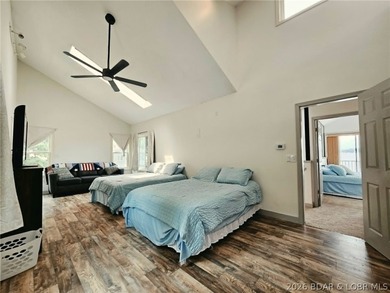 Step inside to vaulted ceilings and a stunning primary suite - photo 19
