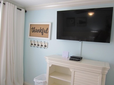 Step into your own coastal escape with this beautifully updated - photo 19