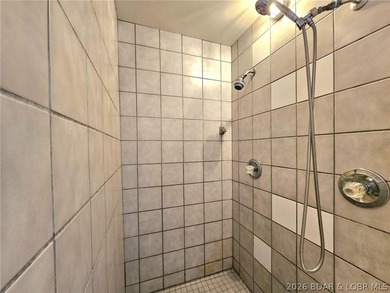 Step inside to vaulted ceilings and a stunning primary suite - photo 21