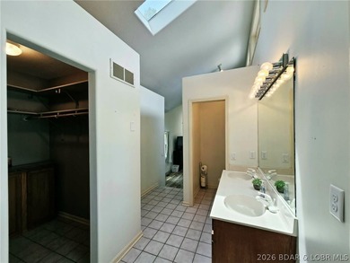 Step inside to vaulted ceilings and a stunning primary suite - photo 22