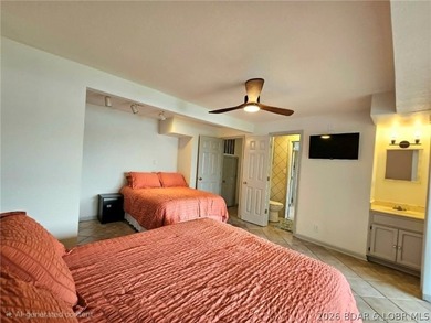 Step inside to vaulted ceilings and a stunning primary suite - photo 29