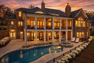 RECENT PRICE IMPROVEMENT OF ~$400K- An extraordinary custom golf - photo 2