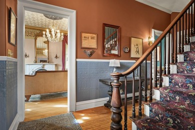 Wake to sunlight streaming thru tall windows as the house stirs - photo 12