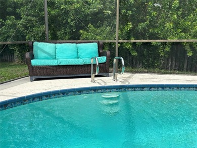 This well-maintained 3-bedroom, 2-bathroom pool home offers a - photo 22