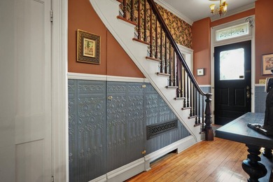 Wake to sunlight streaming thru tall windows as the house stirs - photo 34
