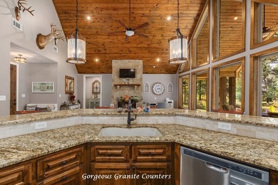 Experience peaceful waterfront living with this custom-built - photo 11