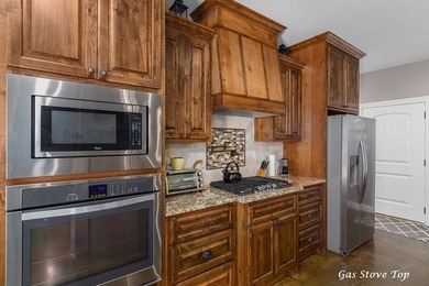 Experience peaceful waterfront living with this custom-built - photo 12