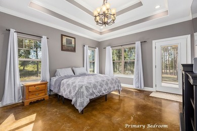 Experience peaceful waterfront living with this custom-built - photo 13