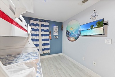 BEACHFRONT BEAUTY! Fabulously updated, this spacious 3-bedroom - photo 4