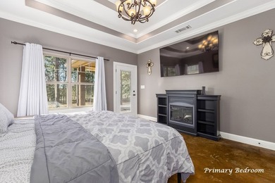 Experience peaceful waterfront living with this custom-built - photo 15