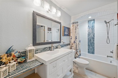 BEACHFRONT BEAUTY! Fabulously updated, this spacious 3-bedroom - photo 6