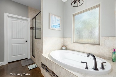 Experience peaceful waterfront living with this custom-built - photo 17