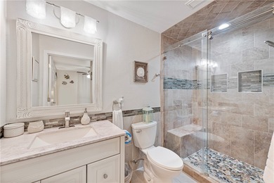BEACHFRONT BEAUTY! Fabulously updated, this spacious 3-bedroom - photo 10