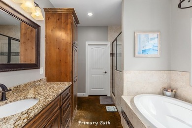 Experience peaceful waterfront living with this custom-built - photo 20