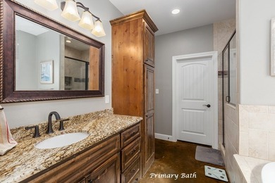 Experience peaceful waterfront living with this custom-built - photo 21