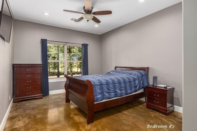 Experience peaceful waterfront living with this custom-built - photo 23