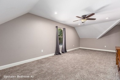 Experience peaceful waterfront living with this custom-built - photo 28
