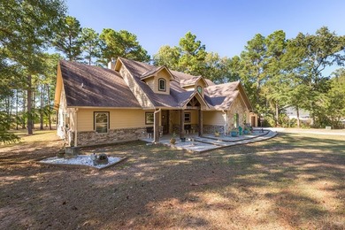 Experience peaceful waterfront living with this custom-built - photo 37