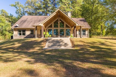 Experience peaceful waterfront living with this custom-built - photo 42