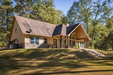 Experience peaceful waterfront living with this custom-built - photo 44