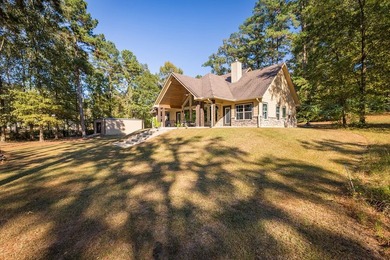 Experience peaceful waterfront living with this custom-built - photo 45