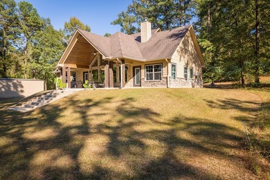 Experience peaceful waterfront living with this custom-built - photo 46