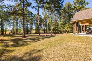 Experience peaceful waterfront living with this custom-built - photo 47