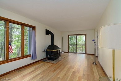 This late 20th-century, three-story contemporary residence - photo 16