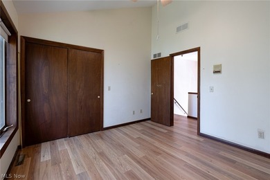 This late 20th-century, three-story contemporary residence - photo 23