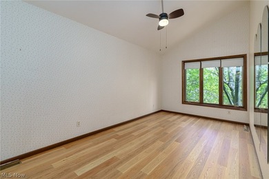 This late 20th-century, three-story contemporary residence - photo 24