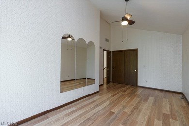 This late 20th-century, three-story contemporary residence - photo 25