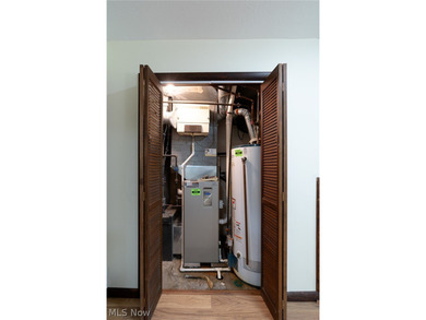 This late 20th-century, three-story contemporary residence - photo 31