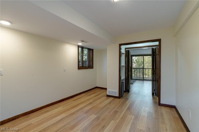 This late 20th-century, three-story contemporary residence - photo 33