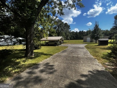 Lake Home For Sale in Butler, Georgia