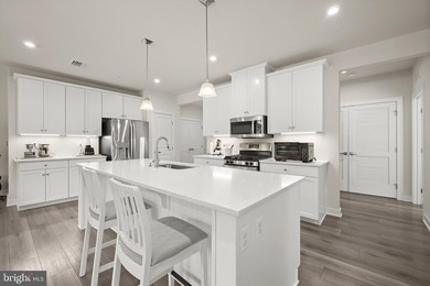 Welcome to this exceptional, nearly new condominium in the - photo 3