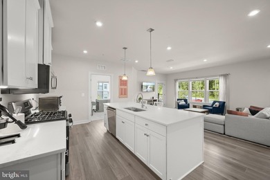 Welcome to this exceptional, nearly new condominium in the - photo 9